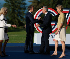 French President Emmanuel Macron and his wife, First Lady of France Brigitte Macron, welcome Canadian Prime Minister Mark Carney and his wife, Diana Fox Carney, during the G7 summit at Hotel Royal Evian on June 15, 2026, in Evian-les-Bains, France. Anna Moneymaker/Pool via REUTERS