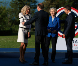 French President Emmanuel Macron and his wife, First Lady of France Brigitte Macron, welcome European Commission President Ursula von der Leyen and her husband, Heiko von der Leyen, during the G7 summit at Hotel Royal Evian on June 15, 2026, in Evian-les-Bains, France. Anna Moneymaker/Pool via REUTERS