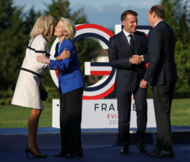 French President Emmanuel Macron and his wife Brigitte Macron greet European Commission President Ursula von der Leyen and her husband Heiko von der Leyen during the G7 summit in Evian-les-Bains, France, June 15, 2026. REUTERS/Isabel Infantes/Pool