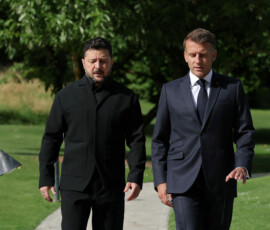 French President Emmanuel Macron and Ukraine's President Volodymyr Zelenskiy walk on the day of the G7 summit, in Evian-les-Bains, France, June 16, 2026. REUTERS/Christian Hartmann