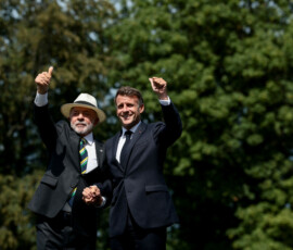 French President Emmanuel Macron and Brazilian President Luiz Inacio Lula da Silva gesture, during the G7 summit in Evian-les-Bains, France, June 16, 2026. REUTERS/Evelyn Hockstein