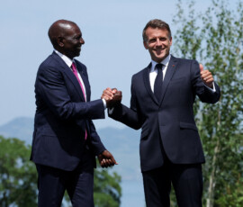 French President Emmanuel Macron welcomes Kenya's President William Ruto during the G7 summit, in Evian-les-Bains, France, June 16, 2026. REUTERS/Christian Hartmann