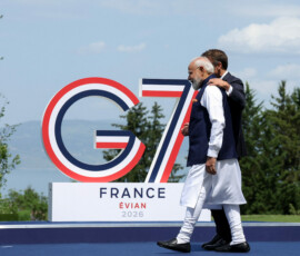 French President Emmanuel Macron welcomes India's Prime Minister Narendra Modi during the G7 summit, in Evian-les-Bains, France, June 16, 2026. REUTERS/Christian Hartmann