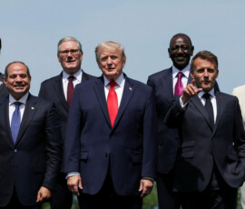 U.S. President Donald Trump, French President Emmanuel Macron, Japanese Prime Minister Sanae Takaichi, Egyptian President Abdel Fattah al-Sisi, South Korea's President Lee Jae Myung, Kenya's President William Ruto and British Prime Minister Keir Starmer pose for a family photo during the G7 summit, in Evian-les-Bains, France, June 16, 2026. REUTERS/Christian Hartmann