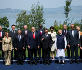 U.S. President Donald Trump, French President Emmanuel Macron, Canadian Prime Minister Mark Carney, Italian Prime Minister Giorgia Meloni, Japanese Prime Minister Sanae Takaichi, European Commission President Ursula von der Leyen, European Council President Antonio Costa, German Chancellor Friedrich Merz, Egyptian President Abdel Fattah al-Sisi, South Korea's President Lee Jae Myung, India's Prime Minister Narendra Modi, Brazilian President Luiz Inacio Lula da Silva, Kenya's President William Ruto and British Prime Minister Keir Starmer pose for a family photo during the G7 summit, in Evian-les-Bains, France, June 16, 2026. REUTERS/Isabel Infantes/Pool