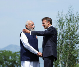 French President Emmanuel Macron welcomes India's Prime Minister Narendra Modi during the G7 summit, in Evian-les-Bains, France, June 16, 2026. REUTERS/Christian Hartmann