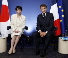 French President Emmanuel Macron and Prime Minister of Japan Sanae Takaichi pose for photographs before their bilateral meeting at Hotel Royal during the G7 summit in Evian-les-Bains, France, 16 June 2026. YOAN VALAT/Pool via REUTERS