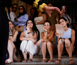 People look on as flamenco dancer Gabriela performs in Plaza de Espana (Spain Square), in Seville, Spain, June 23, 2026. REUTERS/Marcelo del Pozo