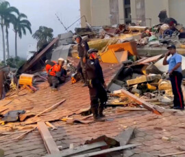 Emergency services work at the site of a collapsed building after a strong earthquake shook north-central Venezuela on Wednesday afternoon, in Caracas, Venezuela, June 24, 2026, in this screengrab from video. REUTERS TV/via REUTERS TPX IMAGES OF THE DAY