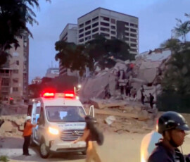 An ambulance at the site of a collapsed building after a strong earthquake shook north-central Venezuela on Wednesday afternoon, in Caracas, Venezuela, June 24, 2026, in this screengrab from video. REUTERS TV/via REUTERS