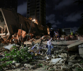 Emergency services work at the site of a collapsed building after an earthquake, in Caracas, Venezuela, June 24, 2026. REUTERS/Gaby Oraa TPX IMAGES OF THE DAY