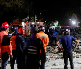Rescuers work at the site of damaged buildings in the aftermath of an earthquake, in Caracas, Venezuela, June 24, 2026. REUTERS/Fausto Torrealba