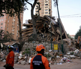 Emergency services work at the site of a collapsed building after earthquakes hit the country, in Caracas, Venezuela, June 25, 2026. REUTERS/Leonardo Fernandez Viloria TPX IMAGES OF THE DAY