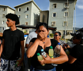A woman reacts in the aftermath of earthquakes in La Guaira, Venezuela, June 25, 2026. REUTERS/Maxwell Briceno