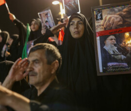 Iranians listen to the national anthem during a rally, as preparations are underway ahead of a farewell ceremony for Iran's late Supreme Leader Ayatollah Ali Khamenei, at Revolution Square in Tehran, Iran, July 2, 2026. REUTERS/Murad Sezer Foreign media in Iran operate under guidelines set by the Ministry of Culture and Islamic Guidance, which regulates press activity and permissions. ISRAEL OUT. NO COMMERCIAL OR EDITORIAL SALES IN ISRAEL. NO ACCESS FOR ISRAELI MEDIA. NO USE BBC PERSIAN. NO USE VOA PERSIAN. NO USE MANOTO. NO USE IRAN INTERNATIONAL. NO USE RADIO FARDA. DIGITAL: NO USE BBC PERSIAN. NO USE VOA PERSIAN. NO USE MANOTO. NO USE IRAN INTERNATIONAL. NO USE RADIO FARDA.
