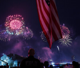 People watch Macy's Fourth of July fireworks as the United States celebrates its 250th anniversary on Independence Day in New York City, U.S., July 4, 2026. REUTERS/Shannon Stapleton