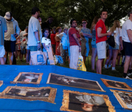 Visitors wait to leave alongside downed fencing at The Great American State Fair on the National Mall as inclement weather moves across the area and visitors were instructed to leave, in Washington, D.C., U.S., July 4, 2026. REUTERS/Cheney Orr