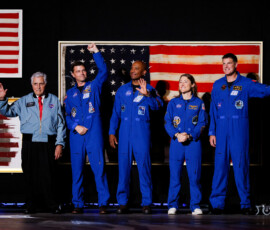 Artemis II crew members and Apollo 17 astronaut Jack Schmitt join U.S. President Donald Trump on stage during a Fourth of July rally, marking the 250th anniversary of U.S. independence, on the National Mall in Washington, D.C., U.S., July 4, 2026. REUTERS/Evan Vucci