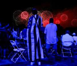 People watch a fireworks display that is attempting the largest firework display in history with 850,000 fireworks, at a Fourth of July rally featuring U.S. President Donald Trump, marking the 250th anniversary of U.S. independence, on the National Mall in Washington, D.C., U.S., July 5, 2026. REUTERS/Evan Vucci