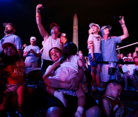 People watch a fireworks display that is attempting the largest firework display in history with 850,000 fireworks, at a Fourth of July rally featuring U.S. President Donald Trump, marking the 250th anniversary of U.S. independence, on the National Mall in Washington, D.C., U.S., July 5, 2026. REUTERS/Evan Vucci