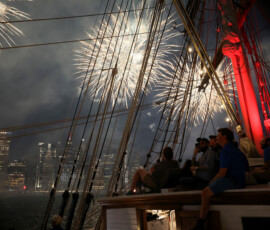People watch Macy's Fourth of July fireworks as the United States celebrates its 250th anniversary on Independence Day, from a ship at Brooklyn Bridge Marina, in New York City, U.S., July 4, 2026. REUTERS/Heather Khalifa