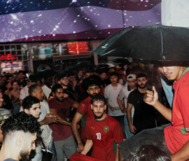 Morocco fans celebrate the team’s 3-0 win over Canada in the FIFA World Cup 2026 Round of 16, in Times Square in the Manhattan borough of New York, U.S., July 5, 2026. REUTERS/Bing Guan