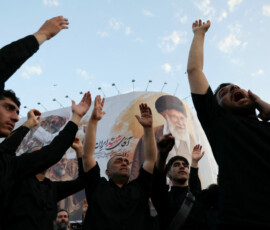 Mourners shout slogans on the day of a funeral procession for Iran's late Supreme Leader Ayatollah Ali Khamenei, who was killed on February 28 in Israeli and U.S. airstrikes, in Tehran, Iran, July 6, 2026. REUTERS/Murad Sezer