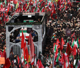 A vehicle carrying coffins of Iran's late Supreme Leader Ayatollah Ali Khamenei and his family members, makes its way as people attend a funeral procession for Khamenei, who was killed on February 28 in Israeli and U.S. airstrikes, in Tehran, Iran, July 6, 2026. Majid Asgaripour/WANA (West Asia News Agency) via REUTERS