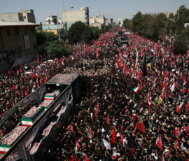 A vehicle carrying coffins of Iran's late Supreme Leader Ayatollah Ali Khamenei and his family members, makes its way as people attend a funeral procession for Khamenei, who was killed on February 28 in Israeli and U.S. airstrikes, in Tehran, Iran, July 6, 2026. Majid Asgaripour/WANA (West Asia News Agency) via REUTERS