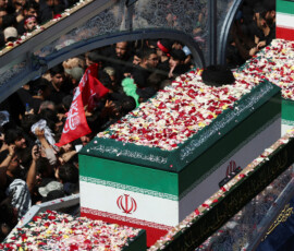 A vehicle carrying coffins of Iran's late Supreme Leader Ayatollah Ali Khamenei and his family members, makes its way as people attend a funeral procession for Khamenei, who was killed on February 28 in Israeli and U.S. airstrikes, in Tehran, Iran, July 6, 2026. Majid Asgaripour/WANA (West Asia News Agency) via REUTERS