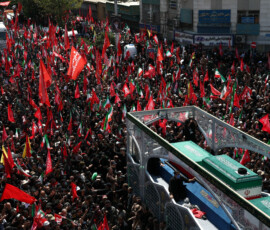 A vehicle carrying coffins of Iran's late Supreme Leader Ayatollah Ali Khamenei and his family members, makes its way as people attend a funeral procession for Khamenei, who was killed on February 28 in Israeli and U.S. airstrikes, in Tehran, Iran, July 6, 2026. Majid Asgaripour/WANA (West Asia News Agency) via REUTERS