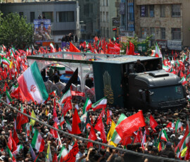 A vehicle carrying coffins of Iran's late Supreme Leader Ayatollah Ali Khamenei and his family members, makes its way as people attend a funeral procession for Khamenei, who was killed on February 28 in Israeli and U.S. airstrikes, in Tehran, Iran, July 6, 2026. REUTERS/Murad Sezer
