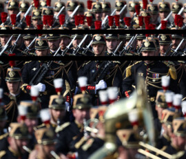 French Republican Guards stand in position before the start of the annual Bastille Day military parade on the Place de la Concorde in Paris, France, July 14, 2026. REUTERS/Tom Nicholson
