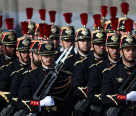French Republican Guards stand in position before the start of the annual Bastille Day military parade on the Place de la Concorde in Paris, France, July 14, 2026. REUTERS/Tom Nicholson