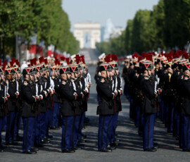 French Republican Guards stand in position on the Place de la Concorde before the start of the annual Bastille Day military parade on the Champs Elysees avenue in Paris, France, July 14, 2026. REUTERS/Benoit Tessier/Pool