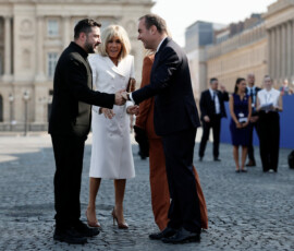 French Prime Minister Sebastien Lecornu and Brigitte Macron, wife of French President Emmanuel Macron, welcome Ukraine's President Volodymyr Zelenskiy and his wife Olena Zelenska at the Place de la Concorde before the start of the annual Bastille Day military parade in Paris, France, July 14, 2026. REUTERS/Benoit Tessier/Pool