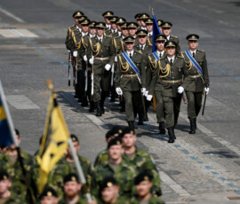 A contingent of Ukrainian soldiers march during the annual Bastille Day military parade on the Champs-Elysees avenue in Paris, France, July 14, 2026. REUTERS/Benoit Tessier