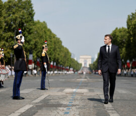 French President Emmanuel Macron reviews the troops on the Place de la Concorde during the annual Bastille Day military parade in Paris, France, July 14, 2026. REUTERS/Benoit Tessier/Pool