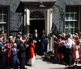 British Prime Minister Keir Starmer, accompanied by his wife Victoria Starmer, walks out of 10 Downing Street to deliver a statement before resigning and transferring power to Labour leader Andy Burnham, in London, Britain, July 20, 2026. REUTERS/Jack Taylor