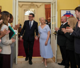 Staff clap as new Prime Minister Andy Burnham and wife Marie-France van Heel walk into 10 Downing Street in London, Monday, July 20, 2026. Kin Cheung/Pool via REUTERS