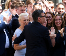Britain's newly appointed Prime Minister Andy Burnham holds his wife Marie-France van Heel's arm, after delivering a speech outside 10 Downing Street after taking office, in London, Britain, July 20, 2026. REUTERS/Temilade Adelaja