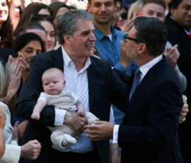 Britain's newly appointed Prime Minister Andy Burnham greets Liverpool City Region Mayor Steve Rotheram, who's holding his grandson, as he arrives at 10 Downing Street on his first day in office, in London, Britain, July 20, 2026. REUTERS//Temilade Adelaja