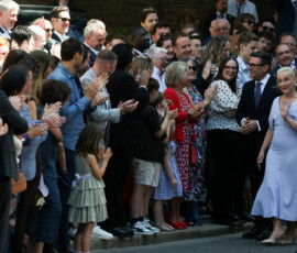 Britain's newly appointed Prime Minister Andy Burnham and his wife Marie-France van Heel greet supporters and lawmakers as they arrive at 10 Downing Street for Burnham's first day in office, in London, Britain, July 20, 2026. REUTERS/Temilade Adelaja